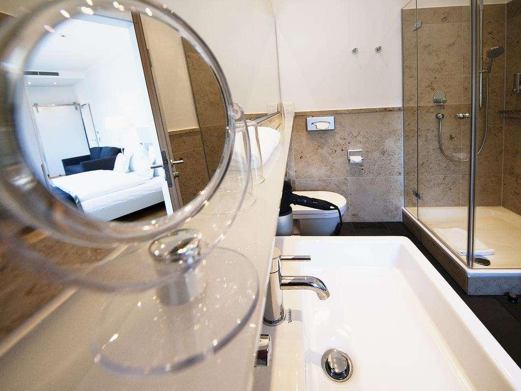 Qube Hotel Bahnstadt Heidelberg Værelse billede